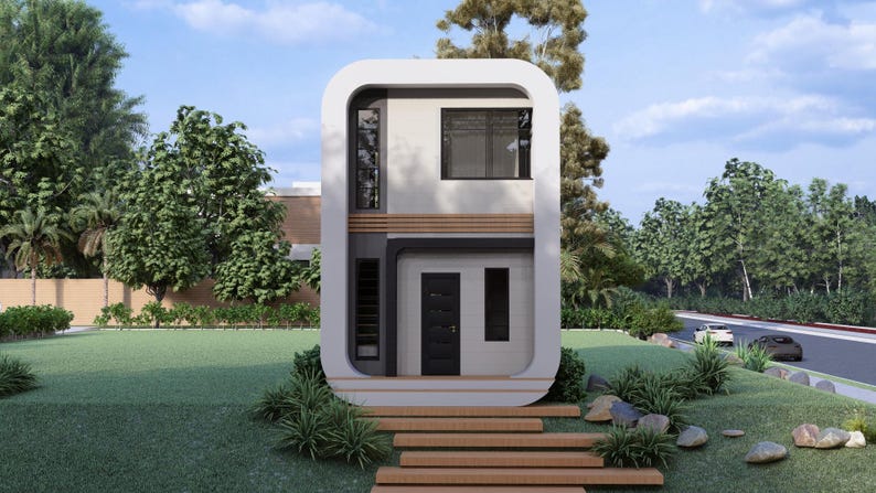 Puede incluir: Una moderna casa de dos pisos con un dise&ntilde;o redondeado &uacute;nico. El exterior presenta un marco blanco, una puerta oscura y un peque&ntilde;o balc&oacute;n. La casa est&aacute; rodeada de hierba verde, &aacute;rboles y una carretera pavimentada.