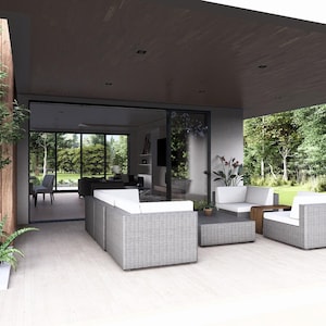 May include: A modern outdoor patio set in light grey woven material. The set comprises a sectional sofa, two armchairs, and a coffee table. The patio has a wooden ceiling and overlooks a green garden.