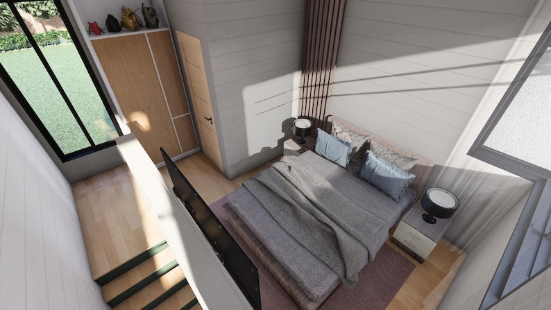 Puede incluir: Una vista interior de un dormitorio moderno con una cama, mesitas de noche y una ventana grande. La cama tiene un edred&oacute;n gris y almohadas azules. La habitaci&oacute;n tiene paredes claras y pisos de madera. Una ventana grande ofrece vistas al exterior.