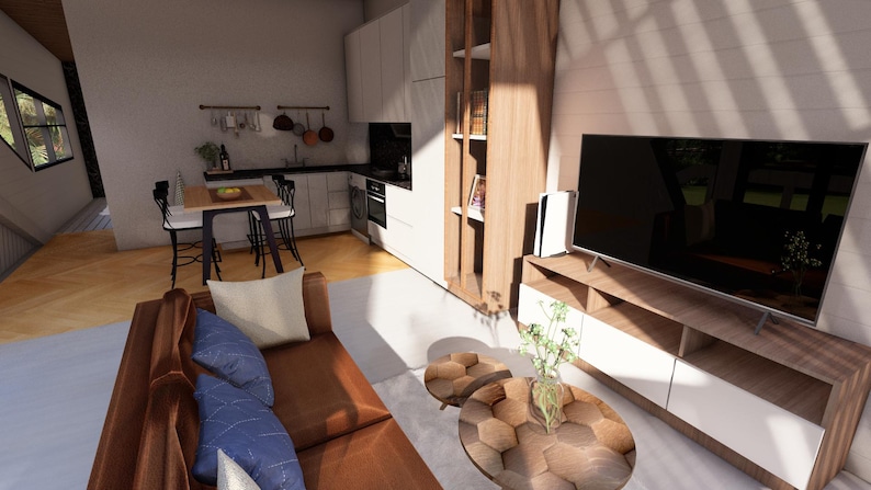 K&ouml;nnte beinhalten: Ein modernes Wohnzimmer mit einem braunen Ledersofa, blauen Kissen und einem Holztisch. Ein gro&szlig;er Flachbildfernseher steht auf einer Holzkonsolen. Die K&uuml;che hat wei&szlig;e Schr&auml;nke und einen kleinen Esstisch.