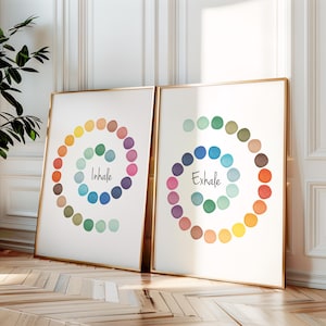 May include: Two framed prints featuring colourful watercolour circles arranged in a spiral pattern. The left print reads "Inhale" and the right print reads "Exhale".