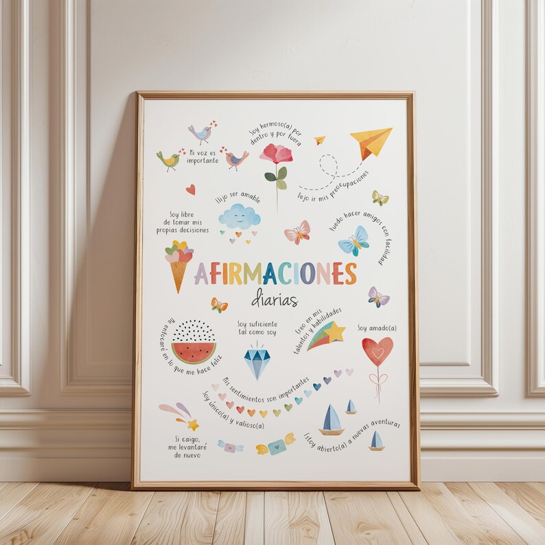 May include: A framed print with colorful illustrations and text in Spanish. The artwork features a variety of images, including birds, flowers, butterflies, and a sailboat. The text includes the words "AFIRMACIONES diarias" and other affirmations.