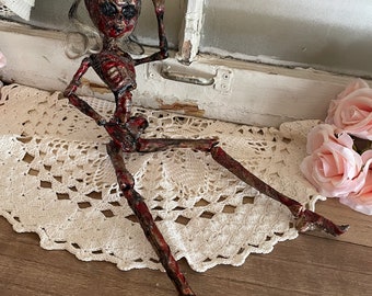 Creepy Decaying Dolly Skeleton Girl