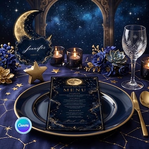 May include: A dark blue menu card with gold celestial accents sits on a matching plate. A crescent moon table sign with the name Jennifer and Table 15, two lit candles in glass holders, a crystal wine glass, and blue flowers complete the set.