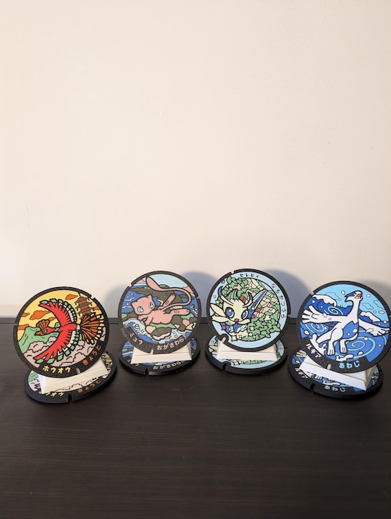 Pokémon Manhole Cover Coaster Set 4 – Mew, Celebi, Ho-oh & Lugia