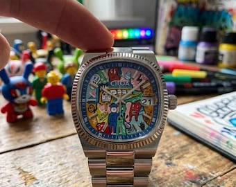 Armbanduhr Graffiti Pop Art: Edelstahlarmband, Datumsanzeige, Unisex-Uhrwerk