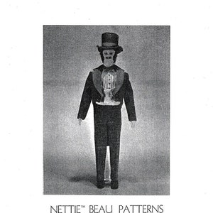 May include: Black and white image of a doll wearing a tuxedo and top hat. The doll is standing on a white background. The image includes the text "Nettie Beau Patterns" and "Set Number 400P1".