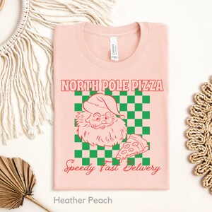North Pole Pizza Shirt, Santa Christmas Shirt, Pizza Lovers Gift, Restaurant Group Gift, Retro Christmas Shirt, Funny Cute Christmas Shirt Heather Peach