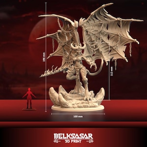 May include: A detailed, beige 3D-printed figurine of a winged demoness, standing on a rocky base. The figure has horns, a tail, and is adorned with chains. The wings span 112 mm, and the figure is 196 mm tall. The base is 100 mm wide. The Belksasar 3D Print logo is at the bottom.