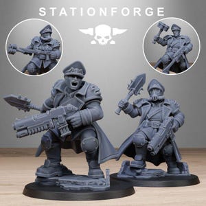 May include: Gray miniature figurines of soldiers in military uniforms, holding weapons. The figurines are on a black base. The word "STATIONFORGE" is at the top of the image, along with a skull and wings logo.