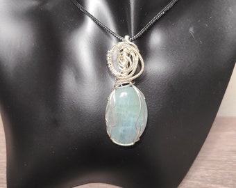 Aqua Marine Pendant hand-wrapped in silver-filled wire.