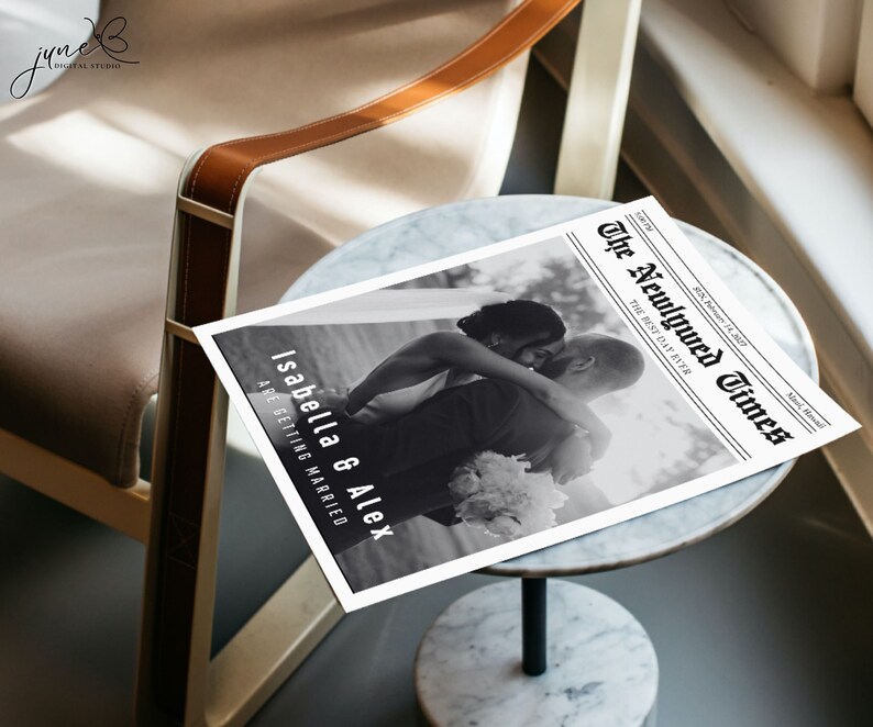 May include: A black and white photo of a couple embracing, printed on a newspaper-style announcement with the headline "The Newlywed Times" and the text "Isabella & Alex are getting married".