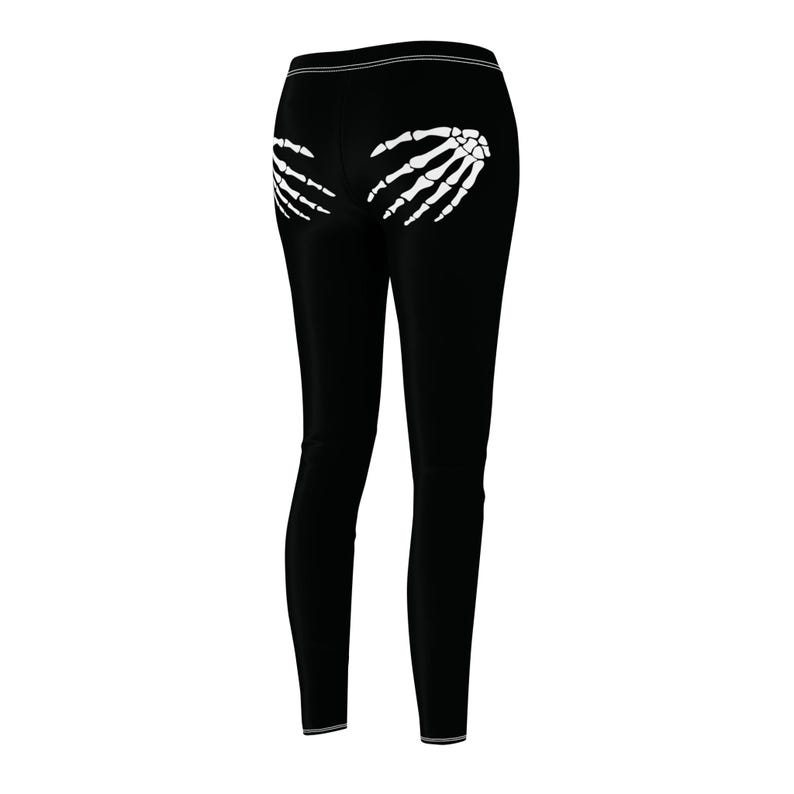 playful black leggings showing two skeleton hands on the rear