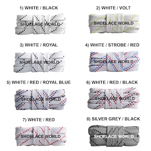 May include: A collection of eight shoelace designs, each featuring a white base with various accent colors. The text "SHOELACE WORLD" is printed on each pair. Color combinations include white/black, white/volt, white/royal, white/strobe/red, white/red/royal blue, white/red/black, white/red, and silver grey/black.