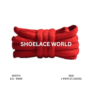 May include: Bright red shoelaces, tightly coiled, with the text "SHOELACE WORLD" in white. The width is 8.5 - 9mm. The image indicates that the product includes 1 pair (2 laces).