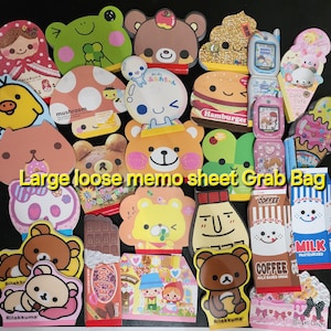 May include: A grab bag of colorful memo sheets featuring various cartoon characters, including a mushroom, a hamburger, a frog, a bear, and a cat. The bag includes a variety of themes, such as food, animals, and holidays. The memo sheets are perfect for adding a touch of fun to your notes, lists, and reminders.
