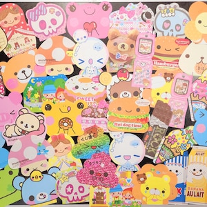 May include: A collection of colorful, cartoon-style stickers featuring various characters, animals, and food items. The stickers are arranged on a black background and include phrases like "mushroom", "sweet", "hamburger", "hot dog time", and "Rilakk".