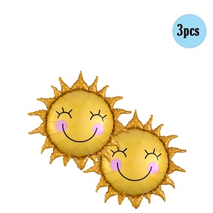 May include: Two yellow smiley face sun balloons with white eyes, pink cheeks, and a black smile. The balloons have white polka dots and are surrounded by a white background. The text "3pcs" is in a blue circle in the upper right corner of the image.