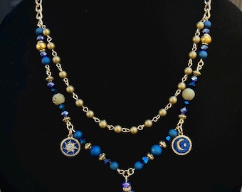 Collar con dije de sol y luna