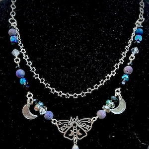 Collana con ciondolo falena e ciondolo