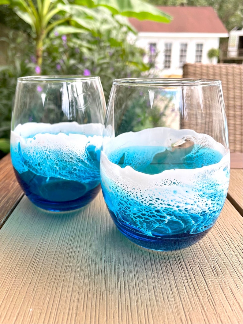 Set of 2 Handcrafted Ocean-Inspired Resin Waves Wine Glasses - Elevate your sipping experience with these artisan wine glasses featuring stunning ocean-inspired resin waves. Expertly handcrafted in Charleston, SC. Unique Coastal Drinkware, Gift Idea