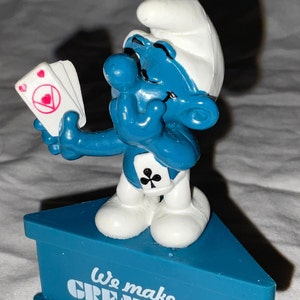 1980’s Vintage Smurf A Gram PVC Figure on Stand - Smurf with Playing Cards - We Make A Great Pair