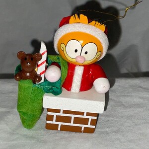 Vintage Garfield the Cat Wooden Christmas Ornament - Garfield Santa with Toy Bag in Chimney