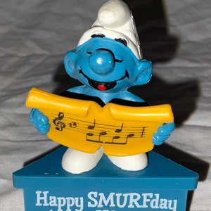 1980’s Vintage Smurf A Gram PVC Figure on Stand - Smurf Holding Music Sheet - Happy SMURFday to You