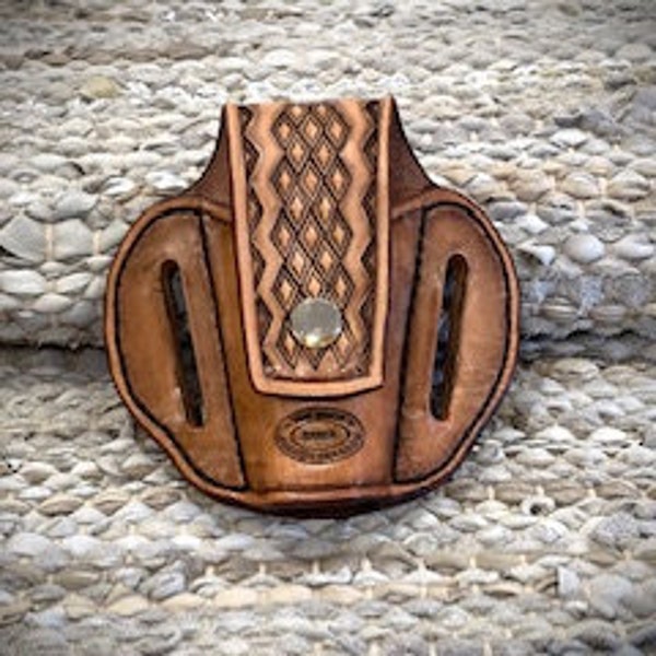 Sheath for the Leatherman tool. Hand made by Sharon Trandem