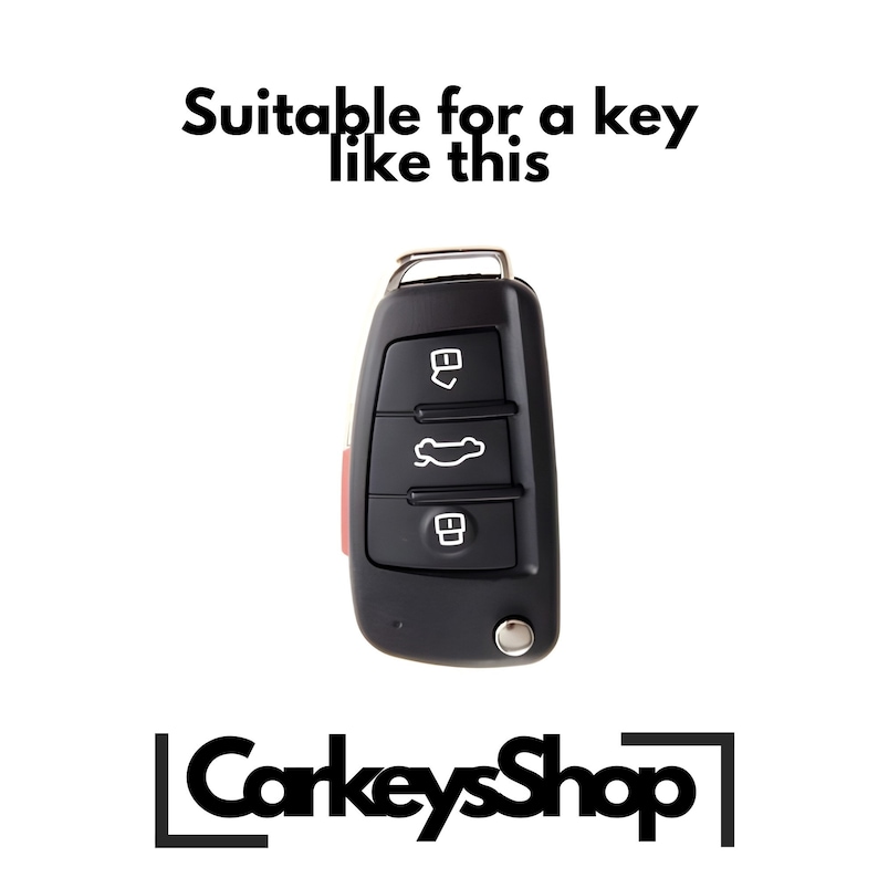 May include: Black car key with three buttons and a red accent. The key has a metal loop for attaching to a keyring. The text "Suitable for a key like this" is above the key.