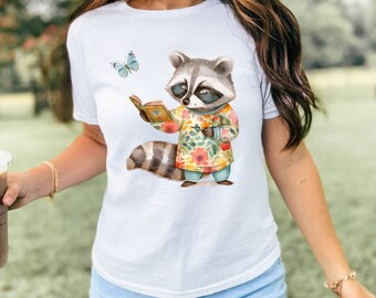 Cute Raccoon Baby Tee, Coquette Baby Tee, Adorable Raccoon Reading Book Graphic Babytee, Trendy Coquette Style Baby Tee