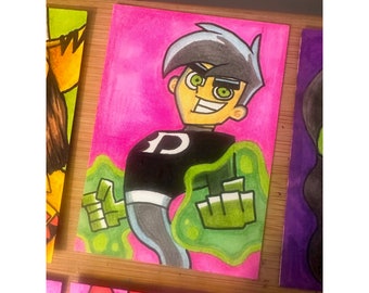 May include: A hand-drawn illustration of a cartoon character with green glowing eyes and a black shirt with a white "P" on it. The character is surrounded by green glowing ectoplasm. The background is pink.