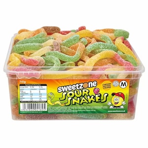 May include: A clear plastic container filled with colorful sour gummy worm candies. The container is labeled "Sweetzone Sour Snakes" and has a cartoon snake and a smiling face on the label. The container is 741 grams.