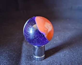 Canica de tiro vintage con espirales moradas, azules y naranjas (2,6 cm)