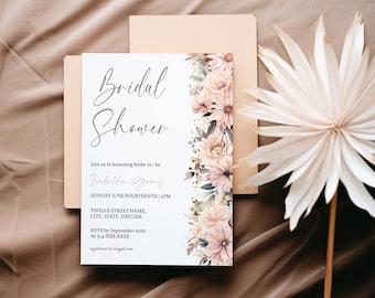 Pode incluir: Um convite de chá de panela branco com um design floral em tons de rosa e verde. O convite inclui o texto "Bridal Shower", "Join us in honoring bride-to-be", "Isabella Gomez", "Sunday June Fourteenth 2PM", "TWELVE STREET NAME, CITY, STATE, ZIPCODE", "RSVP by September 20th", "At 314-XXX-XXXX", and "registered at target.com".