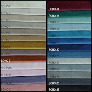 May include: A fabric swatch card with 26 different colors, labeled SOHO-1 through SOHO-26. The colors range from light beige to dark blue.