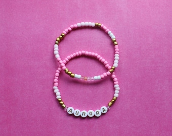 Aurora Beaded Bracelet Stack: made of seed beads, crystal beads and letter beads.