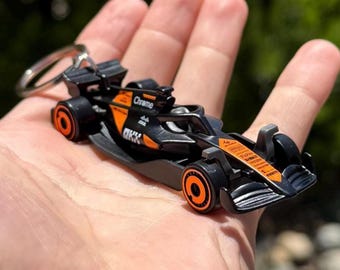 McLaren F1 Team Keychain: Orange Chrome Race Car Charm