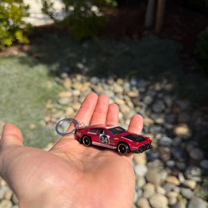 May include: A handmade wooden sign with the text "Welcome" in a playful font. The sign features a distressed white background and a dark brown border, perfect for a front door or entryway. Measures approximately 12 inches wide.