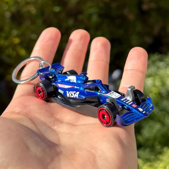 Sleutelhanger - Uitdeelcadeautjes - Ik Snurk Niet, Ik Droom Over Raceauto S Quotes Spreuken Racen Formule 1 Plastic