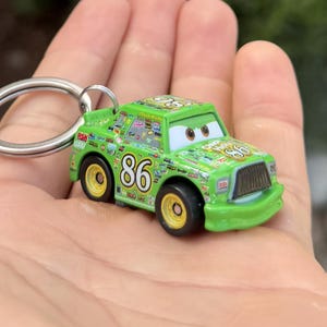 May include: A set of three ceramic mugs with a speckled, matte finish. The mugs are in shades of cream, light gray, and dark gray. Each mug has a simple, minimalist design, perfect for coffee or tea.