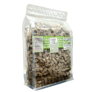 May include: A clear plastic bag filled with brown, cube-shaped food. The bag has a green and white label with the text "Tubifex Cubes" and other product information. The food appears to be for aquatic animals.
