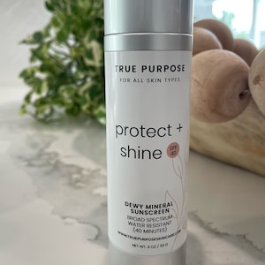 Protect and Shine SPF 40 Dewy Mineral Sunscreen Face and Body Broad Spectrum Water Resistant