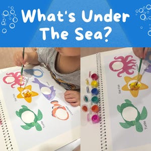 May include: A child is painting a coloring book with the text "What's Under The Sea?" The book features illustrations of sea creatures like an octopus, starfish, and turtle. Paint pots in various colors are visible.