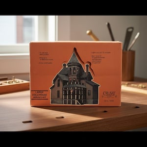 May include: A rectangular orange box for a large dollhouse wiring kit by Cir-Kit Concepts, kit number CK103. The box features an illustration of a multi-story house and lists specifications including a 12-volt tape wiring system and 20-watt transformer.