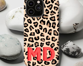 May include: A leopard print phone case with the initials "MD" in red.