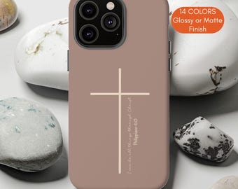 May include: A mauve phone case featuring a white cross design and the text "I can do all things through Christ Philippians 4:13." The case has a matte finish and is available in 14 colors.