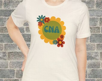 Groovy CNA Tee T-shirt, Retro CNA Tshirt, chemise flower power, chemise d’infirmière, cadeau cna, cadeau de carrière, cadeau pour elle, cadeau pour lui, jolie chemise cna