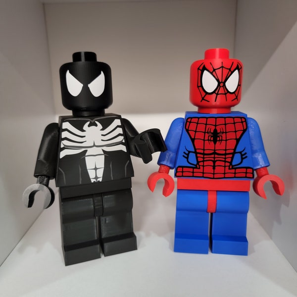 Giant megafigure, spiderman and blacksuit spiderman