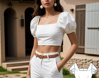 May include: A white crop top with puffed sleeves and a square neckline. The top is shown on a model wearing white pants and a brown belt.